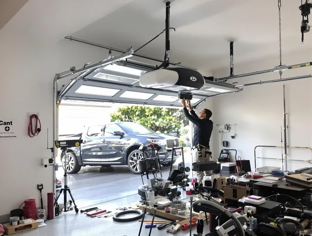 Middletown Garage Door Repair specialist installing smart garage door opener system in Middletown home
