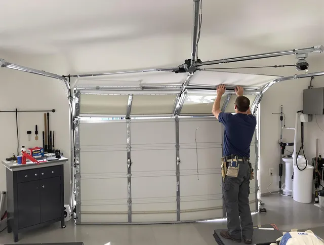 Middletown Garage Door Repair specialist performing precise section replacement on Middletown garage door