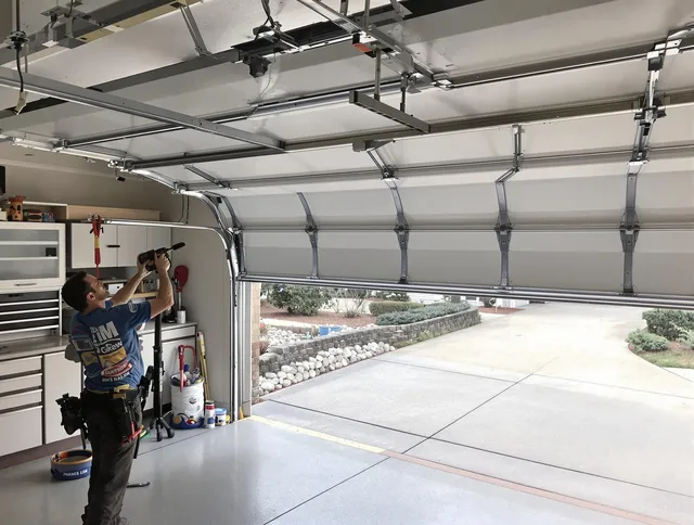 Garage door track repair service by Middletown Garage Door Repair in Middletown